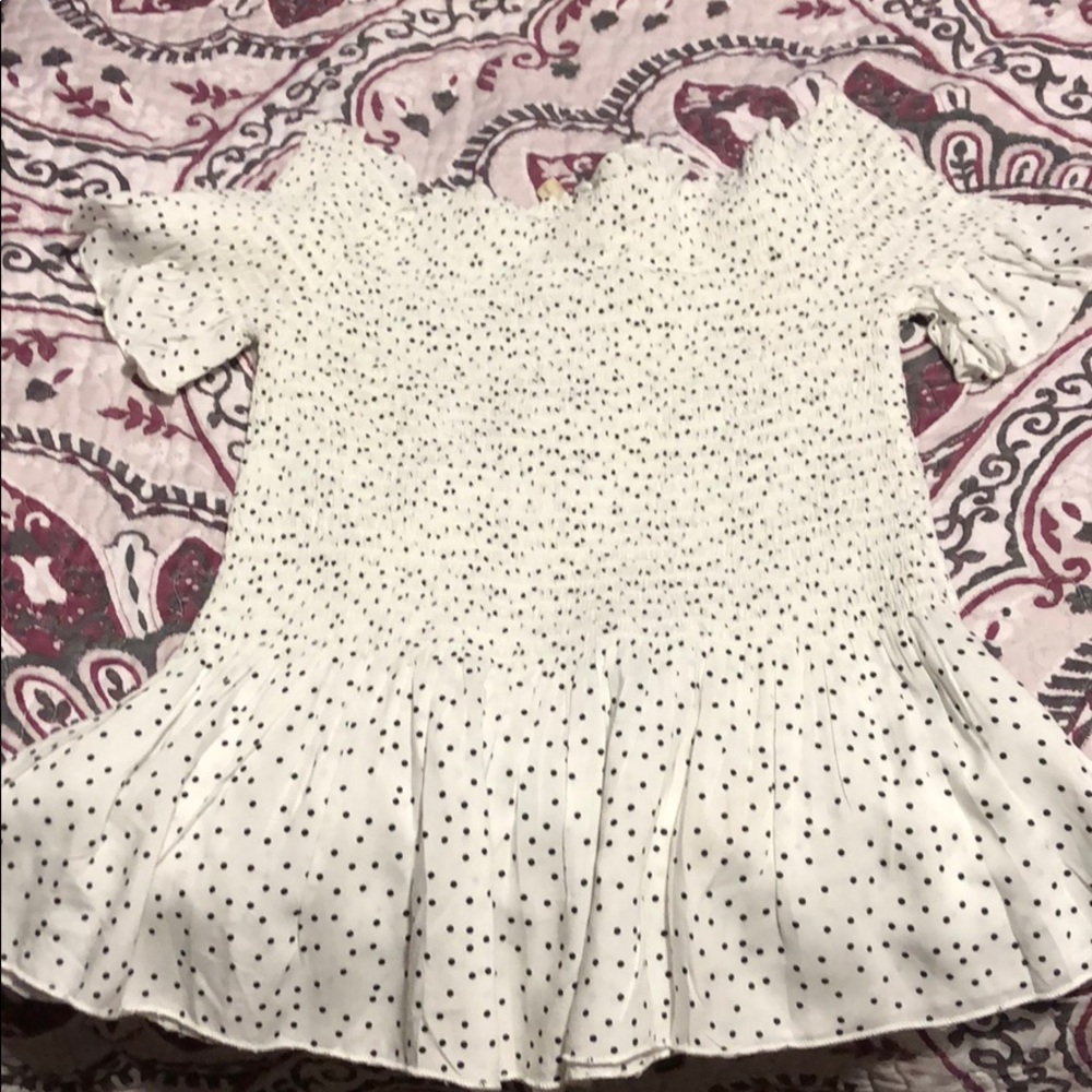 White and black polkadot blouse